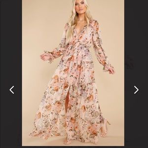 Red Dress Showing Off Peach Floral Maxi Dress